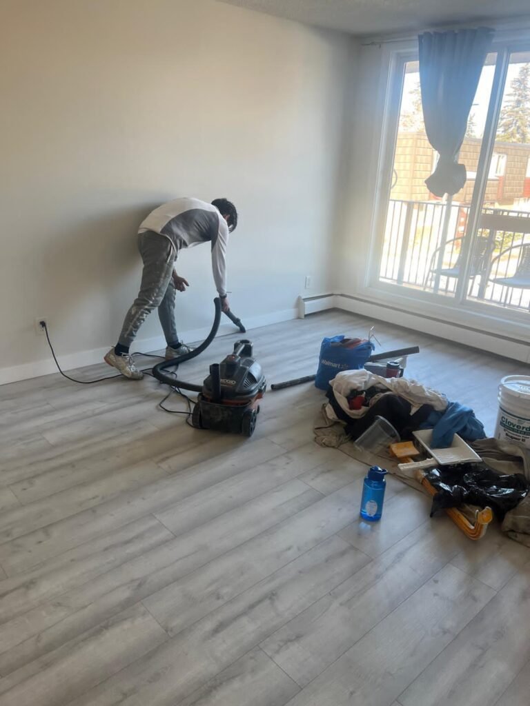 A painter prepping a room in Calgary.