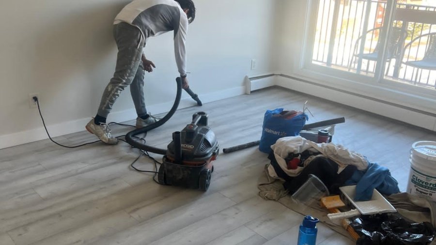A painter prepping a room in Calgary.